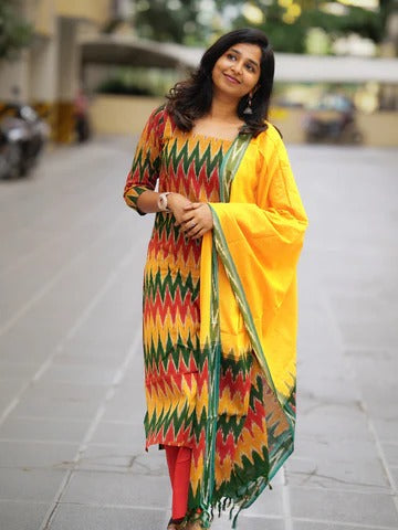 Ikkath suit is vibrant colors and geometric or traditional designs